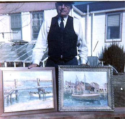 dad_2paintings Displaying two oil paintings in our back yard, 2828 Bangs Ave., Neptune NJ. Behind Dad is the greenhouse that we built together.
