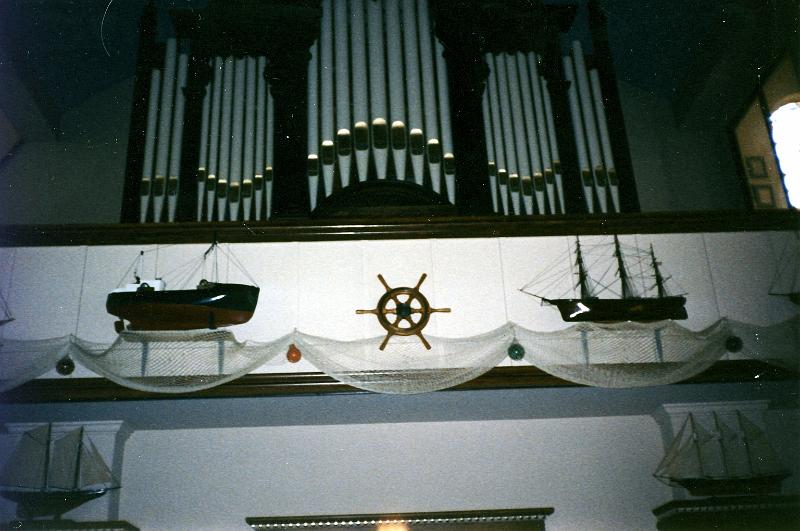 05 Parishoners build models of their ships and place them in the church for good luck.