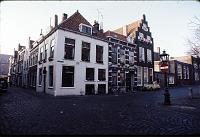 Leiden_building_where_canal_had_been House opposite Peter's Church -- note how the windows show the changing street levels as the dikes built up and land was reclaimed.