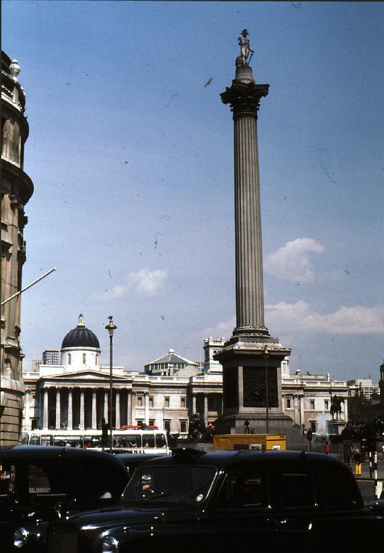 Nelson's_column Alas, the famous London taxicabs, which were very roomy inside and had enough roof clearance for a gentleman to enter and sit wearing his tophat, are disappearing.