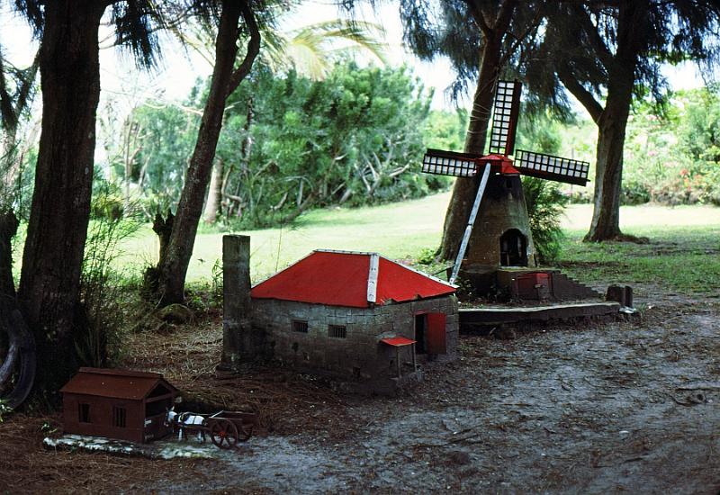 91-model_cane_mill A model of a sugar cane mill.  Donkey carts would deliver the cut cane.  Its juice would be crushed out in the windmill, and boiled down to molasses in the house.