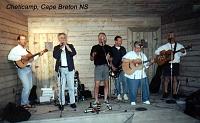 dt-cheticamp-band-2 The summer night boardwalk musicians let me sit in. I'm second from the left, on harmonica.