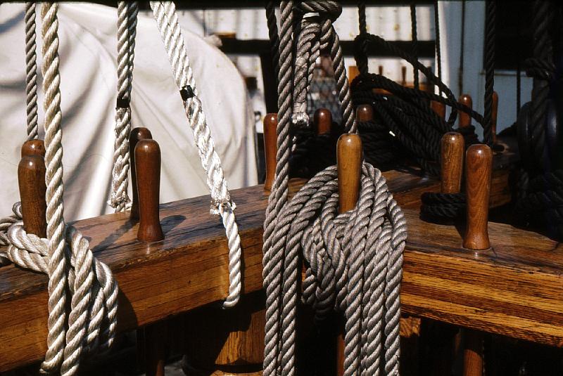 18-lines Lines on belaying pins.  Pull a pin out to quickly release a line.