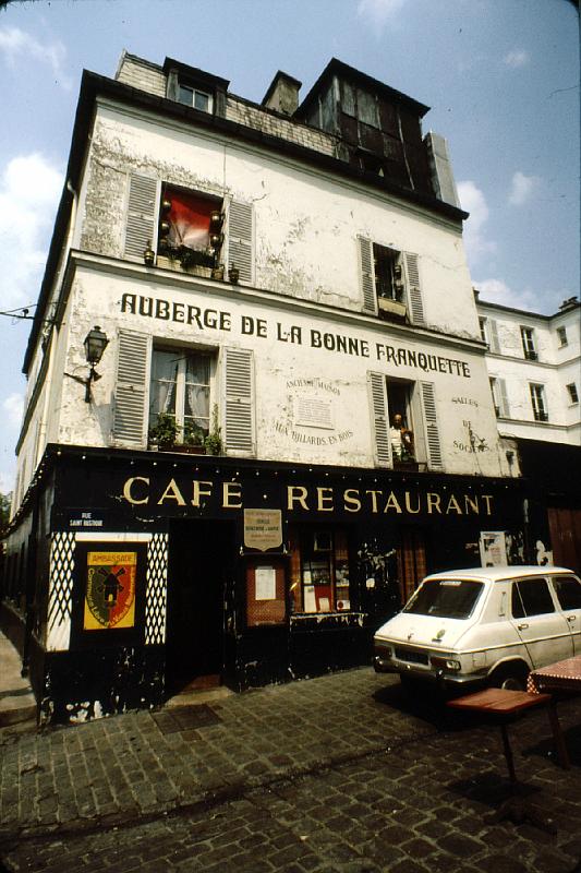 Montmartre_cafe We'll visit Montmartre and then descend the stairway (we went up on a funicular railway in front of Sacre Coeur) and finish our tour at Place Pigale (where Henri Marie Raymond de Toulouse-Lautrec Monfa lived) by the Moulin Rouge.