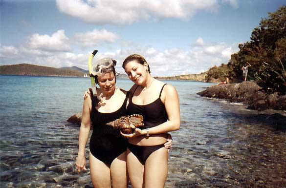 RT-MT-whelk Saint John, US Virgin Islands: We vacationed on Saint John, US Virgin Islands between Christmas 2000 and New Year's Eve of 2001. Near Waterlemon Key. I brought up this whelk, held here by Ruth and Mathilda.