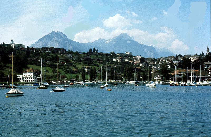 alps_and_Thunersee Lake Thun (German: Thunersee) is a lake in the Bernese Oberland in Switzerland. It is located just north of the Alps, at approximately 46°41′N 7°43′E. The lake is 17.5 km long and 3.5 km wide at its widest point. The surface area is 48.3 km². The maximum depth is 217 m, which gives it a total freshwater volume of about 6.5 km³. The city of Thun is located on the north side of the lake and gives the lake its name.