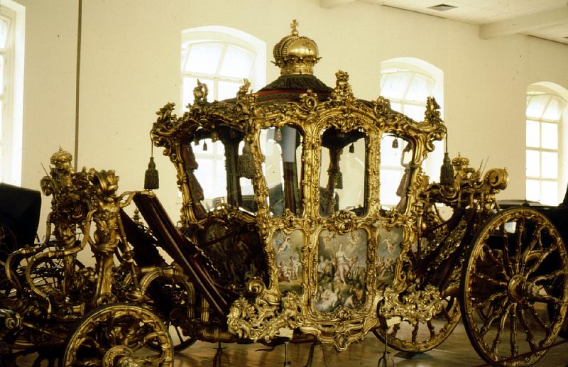 coronation_coach Ruth and I were in Vienna in 1974.  This slide show will feature the coaches of the Hapsburgs, Schönbrunn Palace and its grounds (the Hapsburg home), St. Paul's Cathedral, and some scenes from around the city.

This is the Imperial Carriage of the Vienna Court.  It was designed and built and refurbished many times through the 18th and 19th centuries.  The paintings by Franz Xavier Wagneschön (oddly, the name translates to 