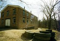 17 Millstones behind the grist mill.